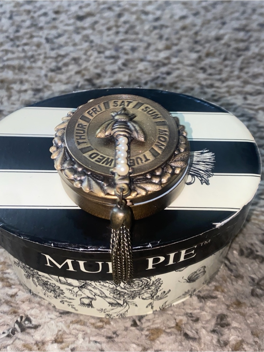 Mud Pie Brass Pill Box with Day Wheel & Tassel